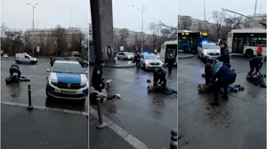Doi bărbați și o femeie, târâți pe jos de polițiști în fața Gării de Nord din Capitală:
