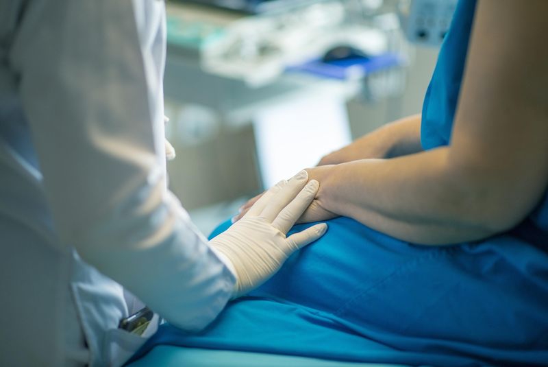 Femeie diagnosticată cu melanom malign în stadiul 3