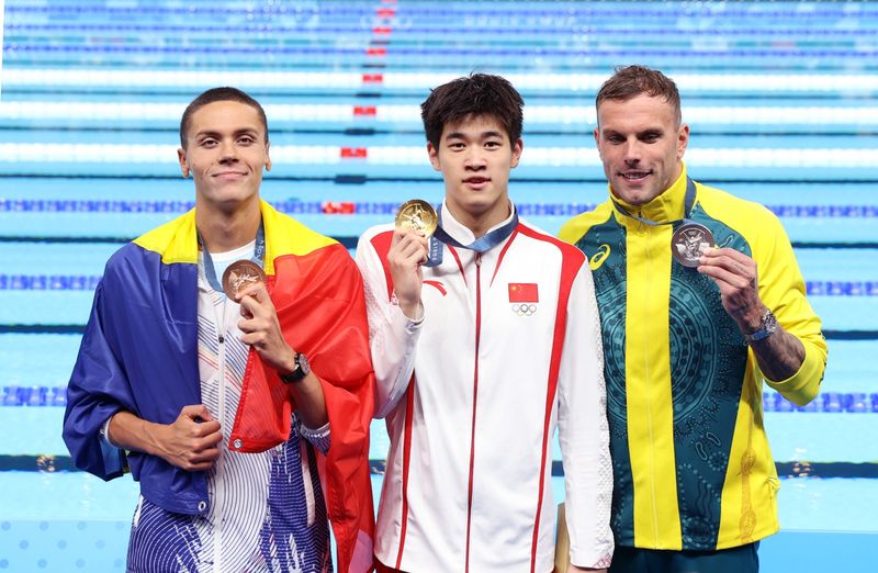 David Popovici, Zhanle Pan și Kyle Chalmers