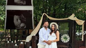 Iustina cu burtica de gravidă alături de Cornel