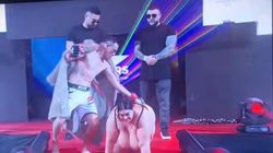 Costică, show total la RXF! Intrare istorică în ring alături de o femeie corpolentă, în lesă, dansurile lascive și atingerile dintre ei au stârnit controverse aprinse | EXCLUSIV