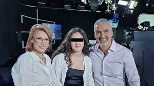 Monica Davidescu și Aurelian Temișan, alături de fiica lor, Dora