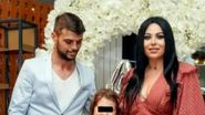 Oana Roman și Marius Elisei, alături de fiica lor, Isabela