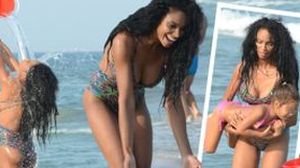 VIDEO EXCLUSIV! Laurette, cea mai sexy mamica! "Manechinul de ciocolata”a facut senzatie pe plaja! Mulatra n-a avut insa ochi decat pentru fetita ei cu care s-a jucat ore in sir!