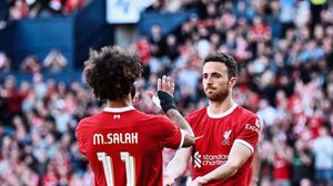 Cei doi marcatori de la Liverpool, Mohamed Salah și Diogo Jota.