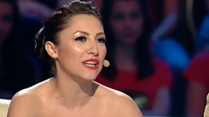 Aceasta e imaginea care i-a facut pe ziaristii unui tabloid sa scrie ca Andra a aparut "aproape goala"