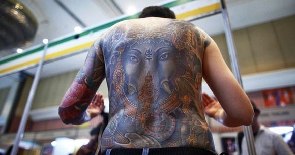 ARTA sau PROST GUST? 25 de oameni care au ales sa fie purtatorii unor TATUAJE EXTREME FOTO