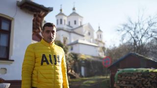 cine este george simion