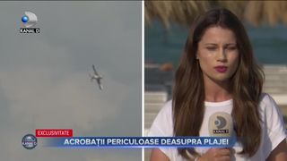 Acrobații periculoase deasupra plajei
