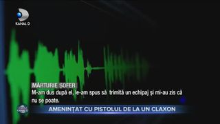 Amenințat cu pistolul de la un claxon