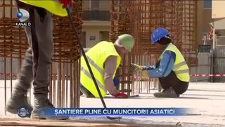 Șantiere pline cu muncitori asiatici