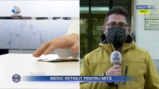 Medic reținut pentru mită