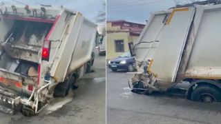 O mașină de gunoi s-a împotmolit în asfaltul surpat din Brăila. A fost nevoie de intervenția unei macarale