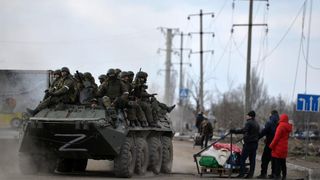 Civilii rămași în Odesa construiesc fortificaţii din saci de nisip în timp ce un băiat interpretează la tobe "It's my life". Trupa Bon Jovi a redistribuit imaginile