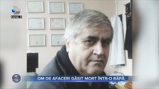 Om de afaceri găsit mort într-o râpă