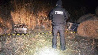  Armă cu lunetă, găsită îngropată într-o zonă de depozitare a gunoiului