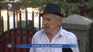 Loviți de ploi violente