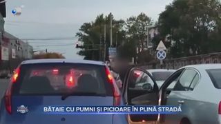 Bătaie cu pumni și picioare în plină stradă
