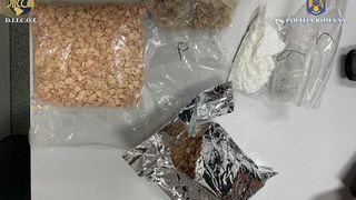 FOTO/VIDEO - Șase percheziții &icirc;n București, &icirc;ntr-un dosar ce vizează traficul de droguri de mare risc. Ce au descoperit procurorii DIICOT