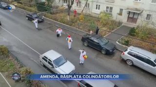 Amendă, răsplata colindătorilor