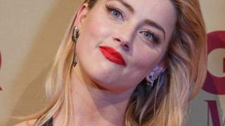 Amber Heard îi va plăti lui Johnny Depp un milion de dolari