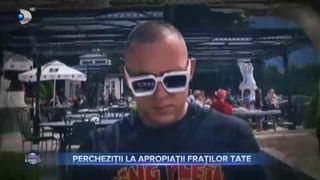 Percheziții la apropiații fraților Tate