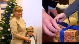 VIDEO - Grija macabră a autorităților ruse, transmisă de un post de televiziune local. Un băiețel de 6 ani, care și-a pierdut tatăl &icirc;n război, a fost recompensat cu un smartwatch și o mașinuță de poliție