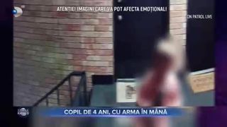 Copil de 4 ani, cu arma în mână