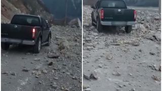 VIDEO - Șofer filmat în timp ce circula pe un drum închis, deși în zonă cad stânci