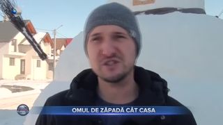 Omul de zăpadă c&acirc;t casa