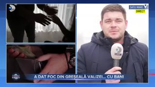 A dat foc din greșeală valizei... cu bani