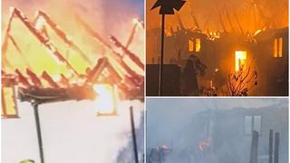 Proprietarii unei case din Anglia au fost salvați ca printr-o minune de cei doi câini, după ce casa lor a luat foc.