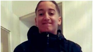 Ofiţerul a spus că a tras cu pistolul de teamă că băiatul ar da peste cineva cu maşina.