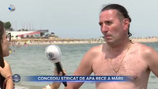 VIDEO - Concediu stricat de apa rece a mării