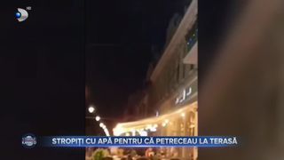 VIDEO- Stropiți cu apă pentru că petreceau la terasă. O femeie a aruncat cu apă pe niște tineri aflați la o terasă