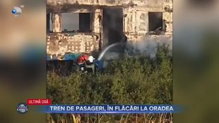 VIDEO - Tren de călători, în flăcări la Oradea: Aproximativ 20 de pasageri au reușit să iasă la timp din vagoane