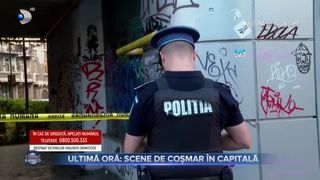 VIDEO - Scene de coșmar &icirc;n Capitală. Un bărbat care și-a atacat iubita amenință că se aruncă de la etajul 8 al unui bloc