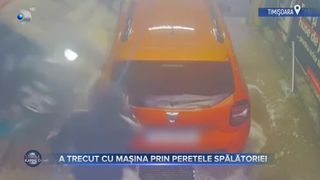 VIDEO- A trecut cu mașina prin peretele spălătoriei. Din mall, a ajuns direct la spălătorie