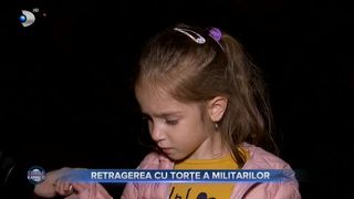 VIDEO - Retragerea cu torțe a militarilor. Zeci de militari din Galați au defilat aseară pe faleza Dunării