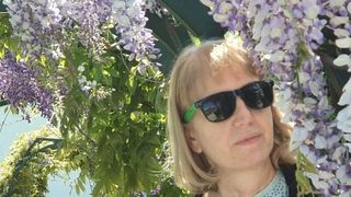 Femeia incendiată în scara unui bloc din Capitală