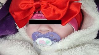 Bebeluș salvat din incendiu