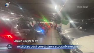VIDEO - Mai mulți șoferi au rămas blocați &icirc;n parcare după haosul de la cumpărături