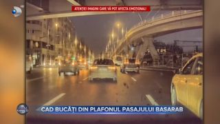 VIDEO- Cad bucăți din plafonul pasajului Basarab. Capota unei mașini a fost lovită!