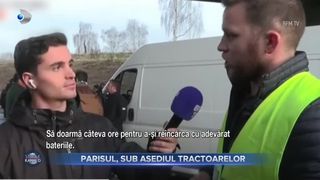 VIDEO - Paris, în continuare sub asediul tractoarelor! Fermierii și-au improvizat tabere în care gătesc, pe străzi