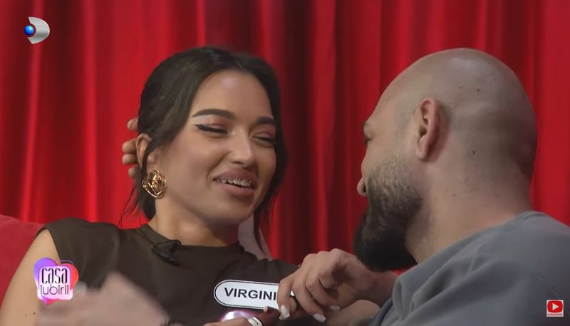 Robi și Virginia, săruturi intense în camera roșie