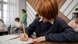 elev la concursul comper