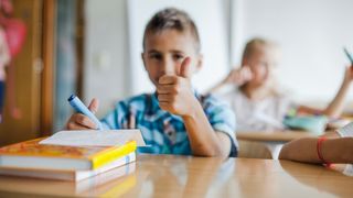 elev la concursul comper