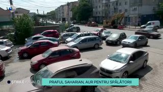 VIDEO- Praful saharian, aur pentru spălătorii. Șoferii au stat la cozi toată ziua, pentru a-și curăța mai repede mașinile. ,,Ne-am făcut prieteni pe aici''