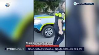 VIDEO: Încătușată cu scandal, în fața copilului de 2 ani