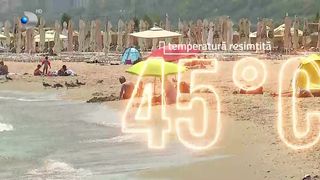 VIDEO Arși de soare, dar nu renunță la plajă! Turiștii se bucură de vacanță indiferent de vreme